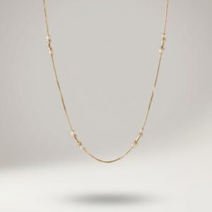Elegant Gold Pearl Station Necklace