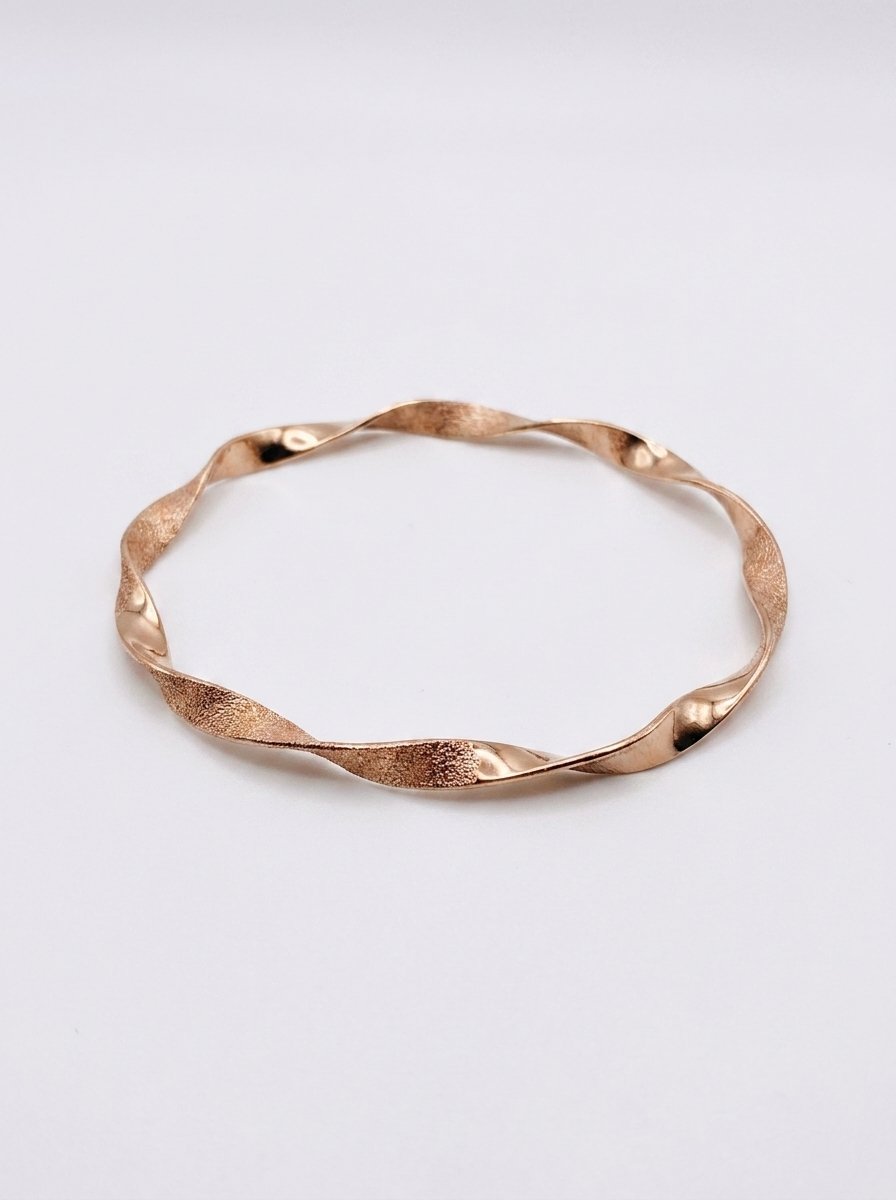 Elegant Twisted Rose Gold Bangle
